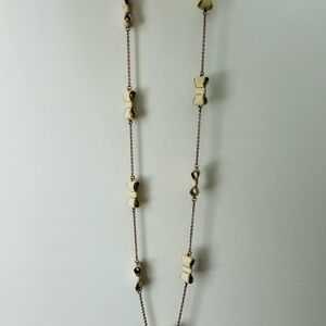 Kate Spade White Enamel and Gold Plated Bow Necklace